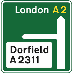 Primary route direction sign with non-primary route to the left