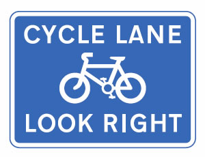 Reminder sign for pedestrians to look out for cyclists 