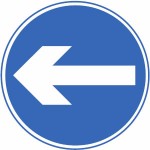 Proceed in direction indicated by the arrow sign