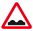 Uneven road sign for the theory test