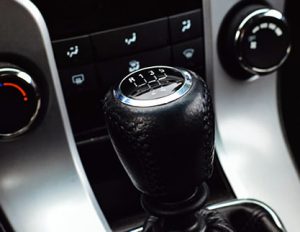 Manual car gear stick. Forward gears 1-5 along with one reverse gear.