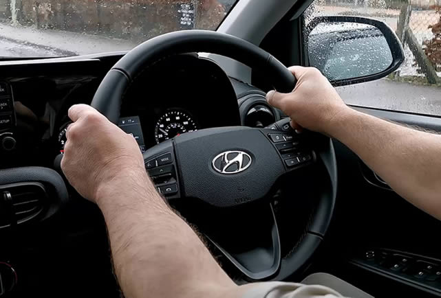 Holding the steering wheel